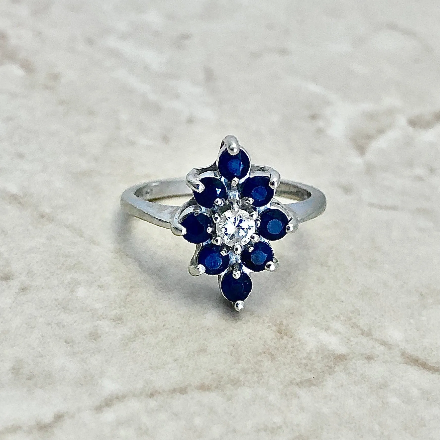 14 Karat White Gold Diamond & Blue Sapphire Halo Navette Ring