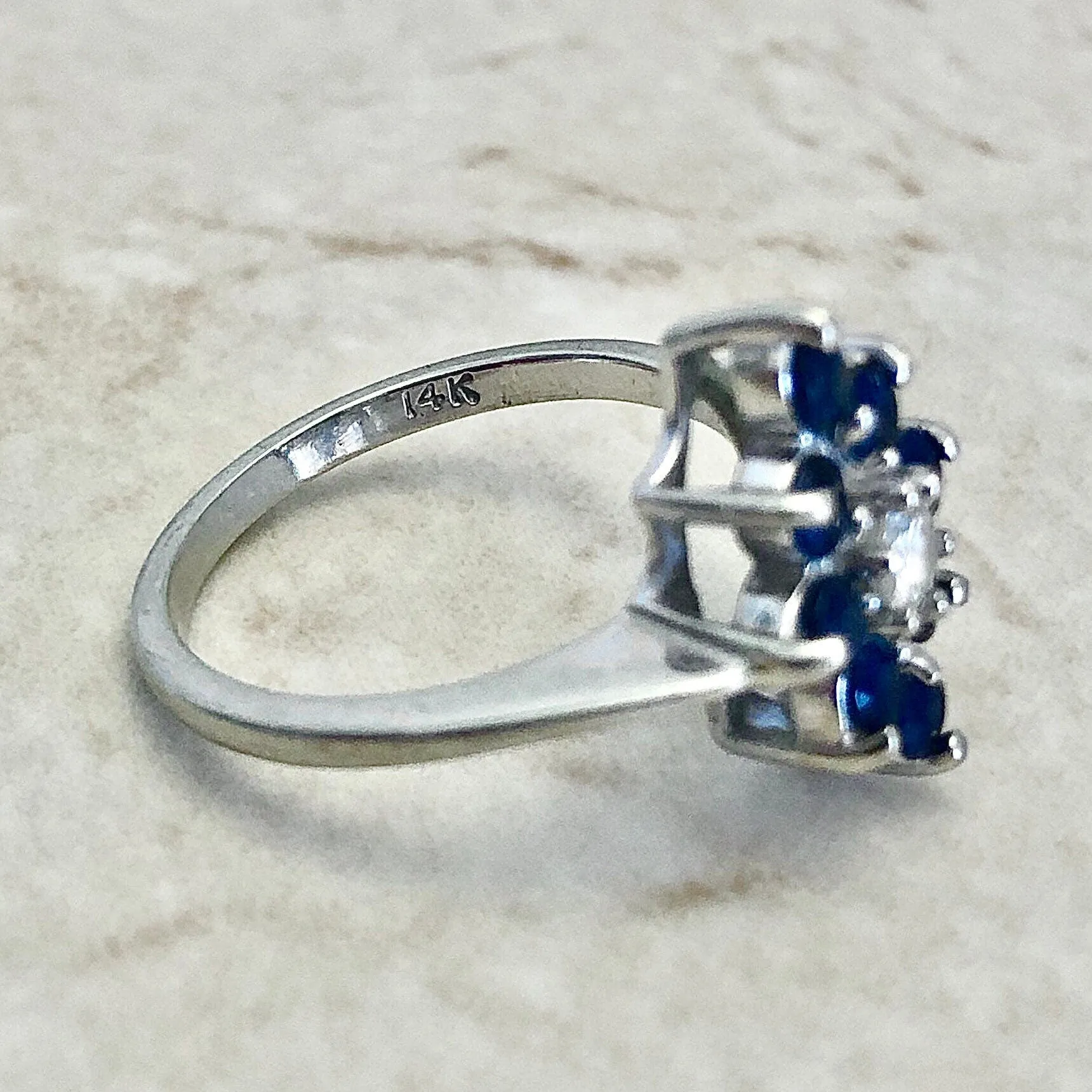 14 Karat White Gold Diamond & Blue Sapphire Halo Navette Ring
