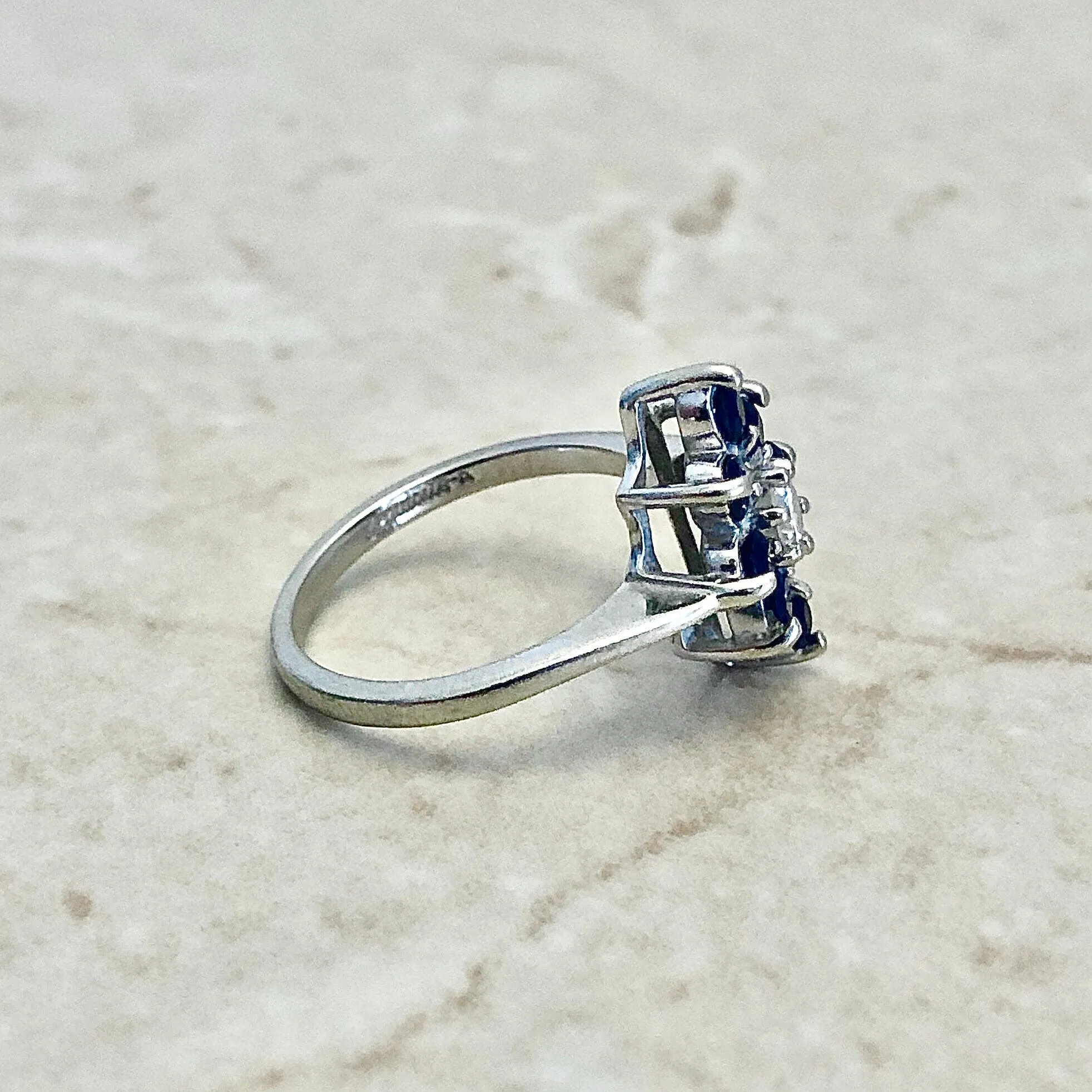 14 Karat White Gold Diamond & Blue Sapphire Halo Navette Ring
