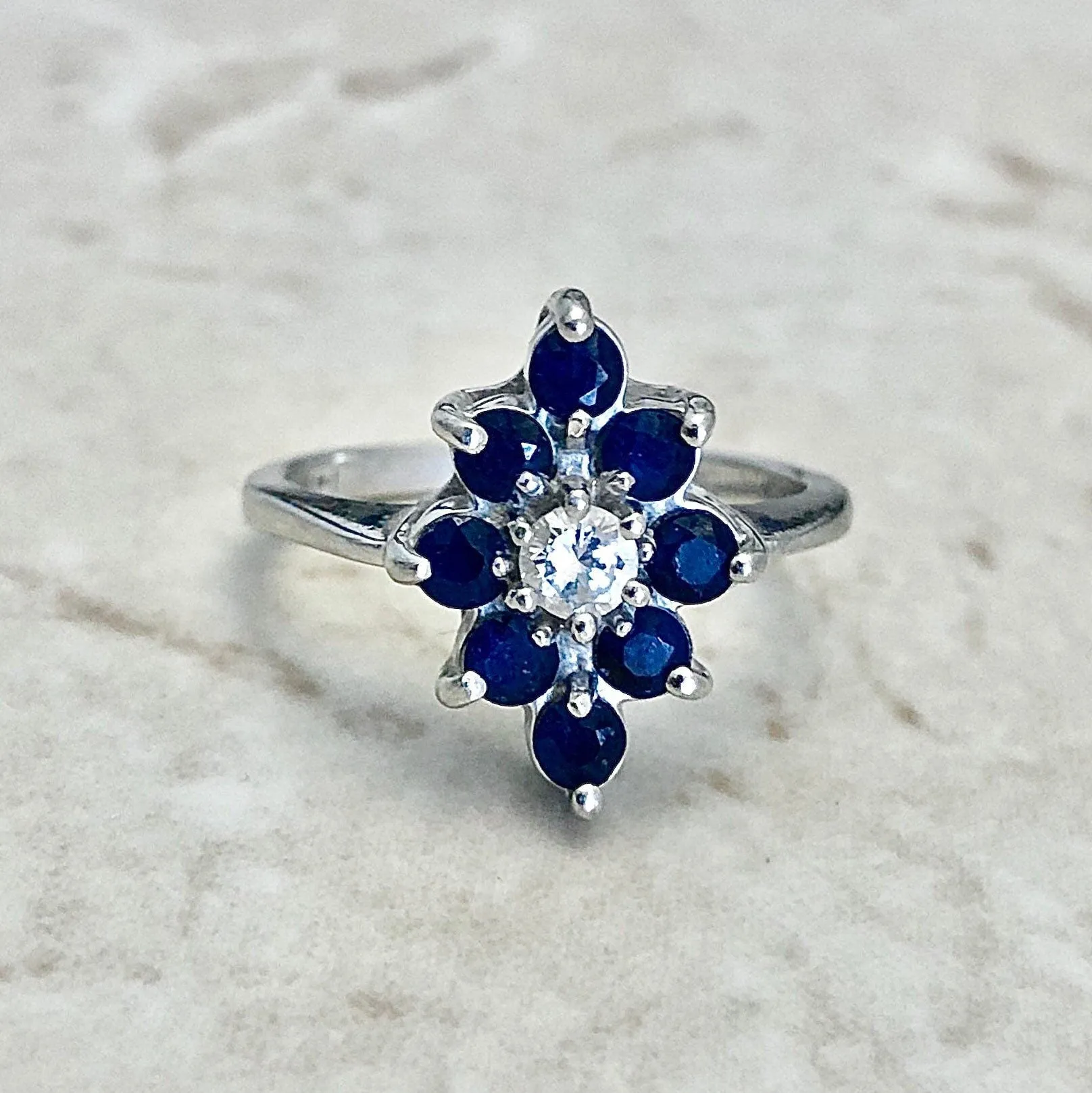 14 Karat White Gold Diamond & Blue Sapphire Halo Navette Ring