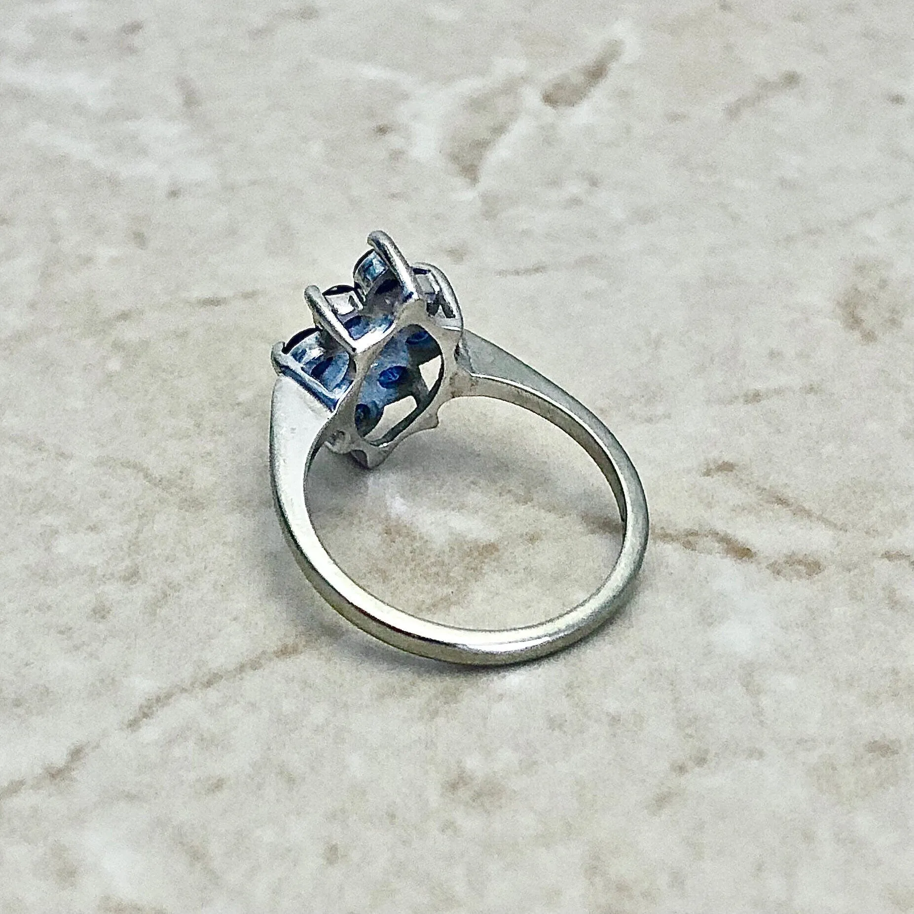 14 Karat White Gold Diamond & Blue Sapphire Halo Navette Ring
