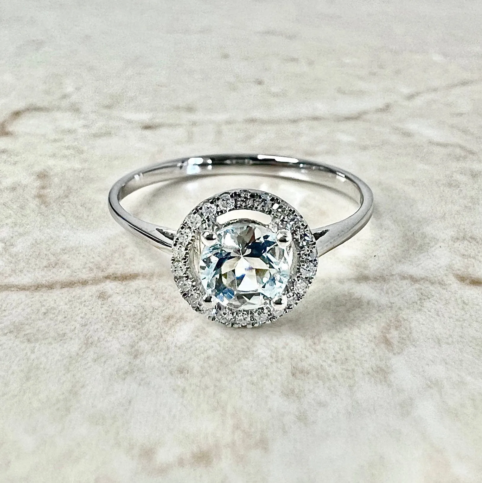 14 Karat White Gold March Birthstone Round Aquamarine & Diamond Halo Ring