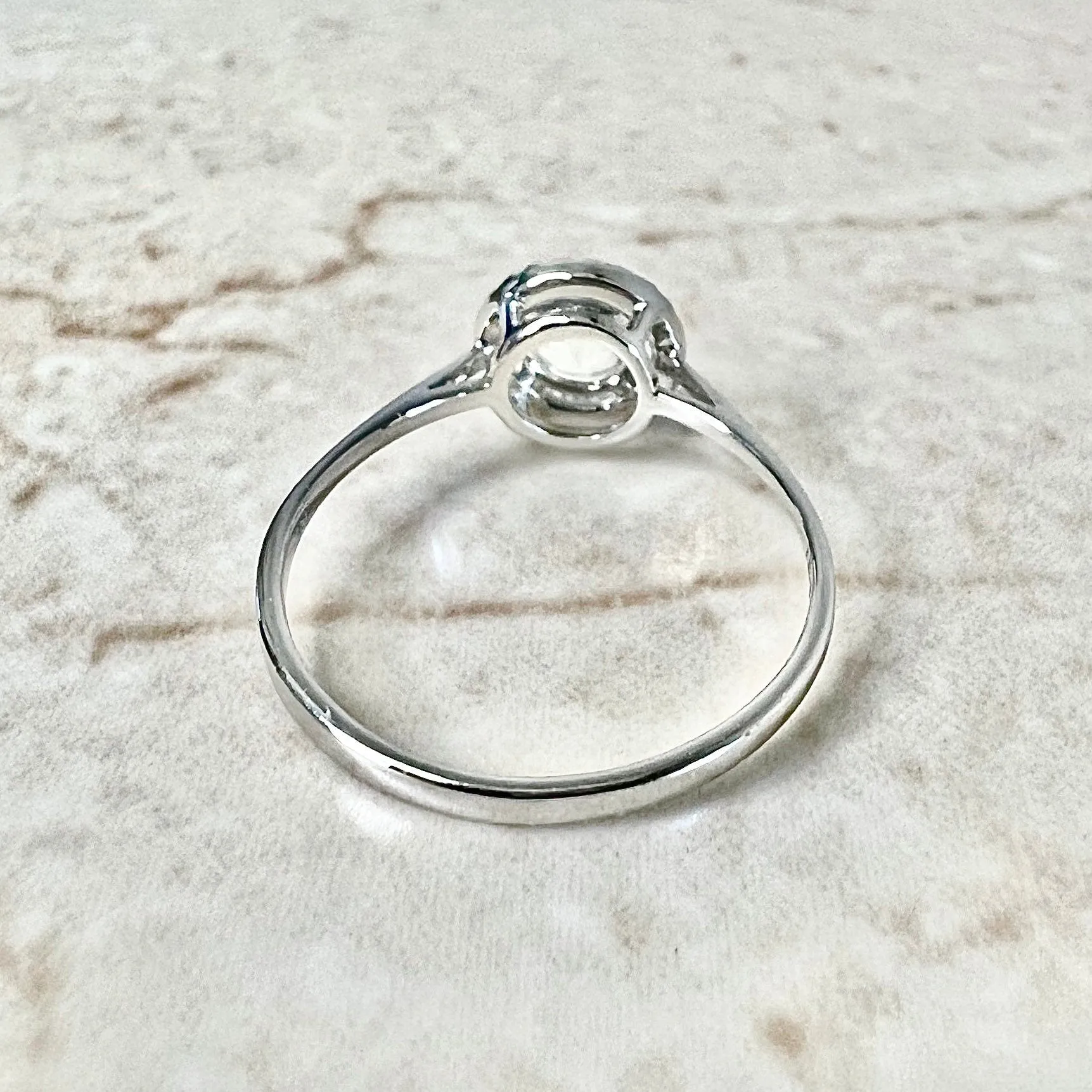 14 Karat White Gold March Birthstone Round Aquamarine & Diamond Halo Ring