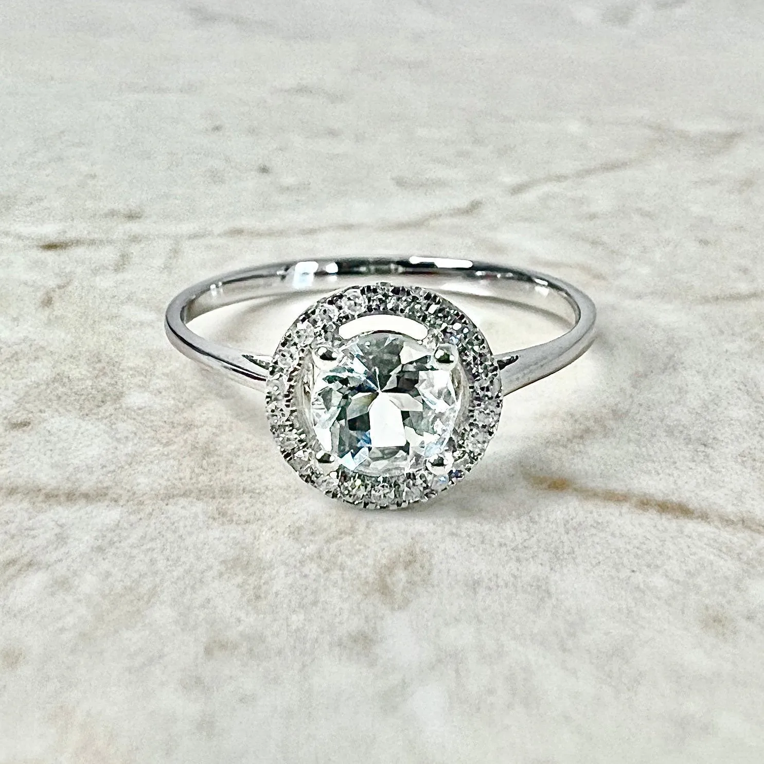 14 Karat White Gold March Birthstone Round Aquamarine & Diamond Halo Ring