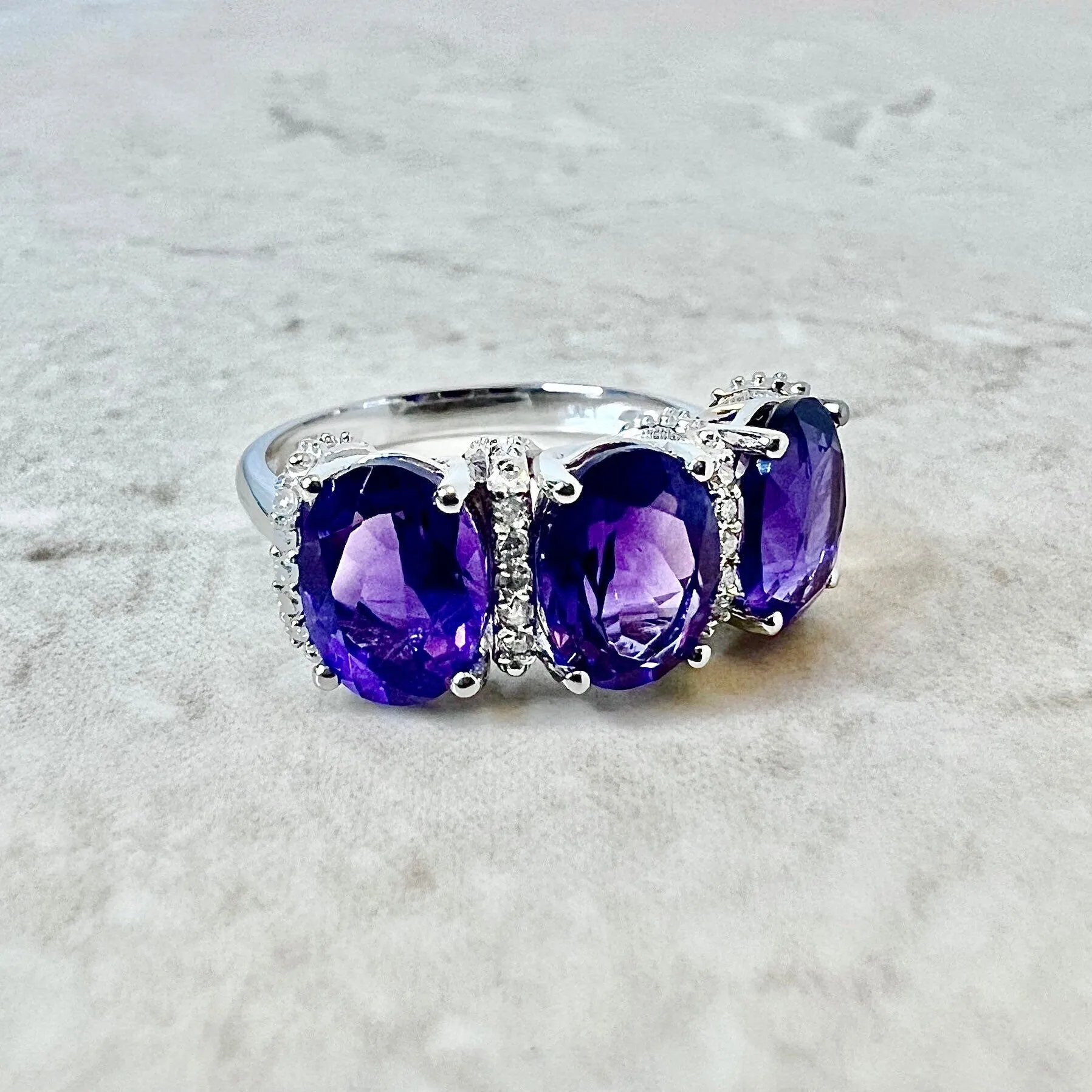 14 Karat White Gold Oval Amethyst & Diamond Three-Stone Ring