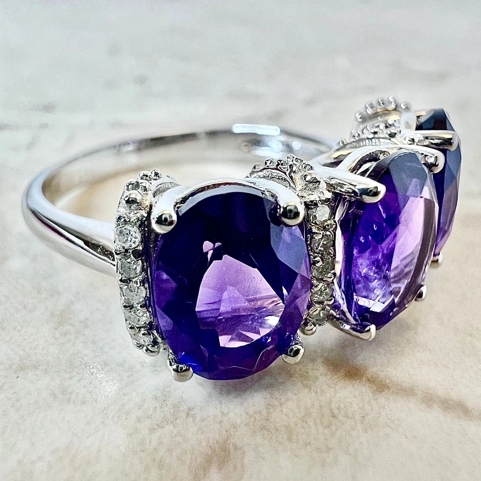 14 Karat White Gold Oval Amethyst & Diamond Three-Stone Ring