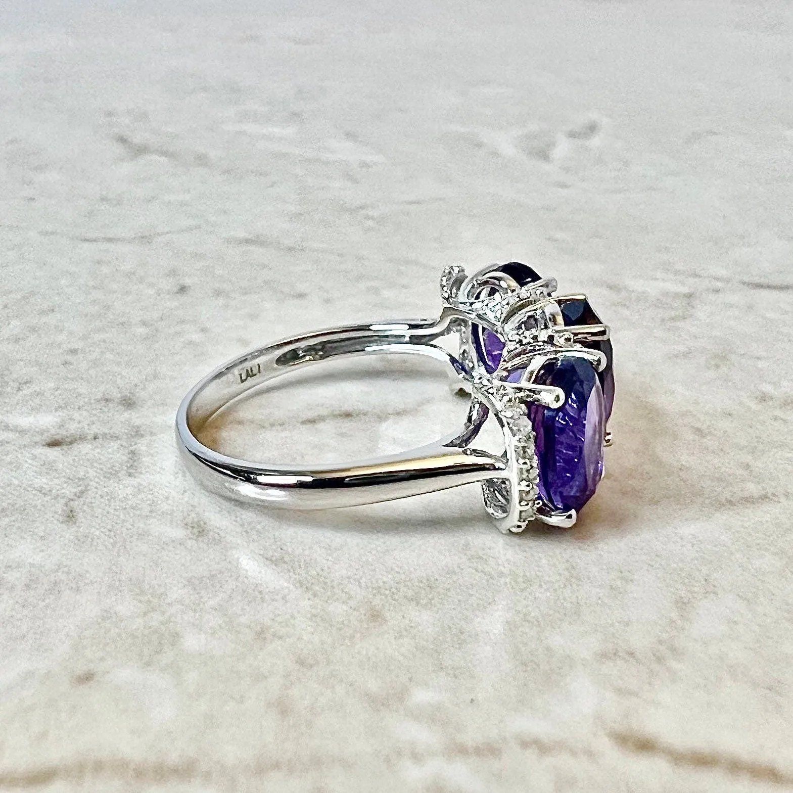 14 Karat White Gold Oval Amethyst & Diamond Three-Stone Ring