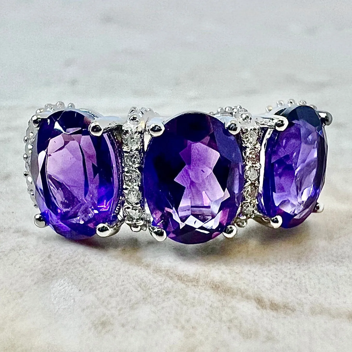 14 Karat White Gold Oval Amethyst & Diamond Three-Stone Ring