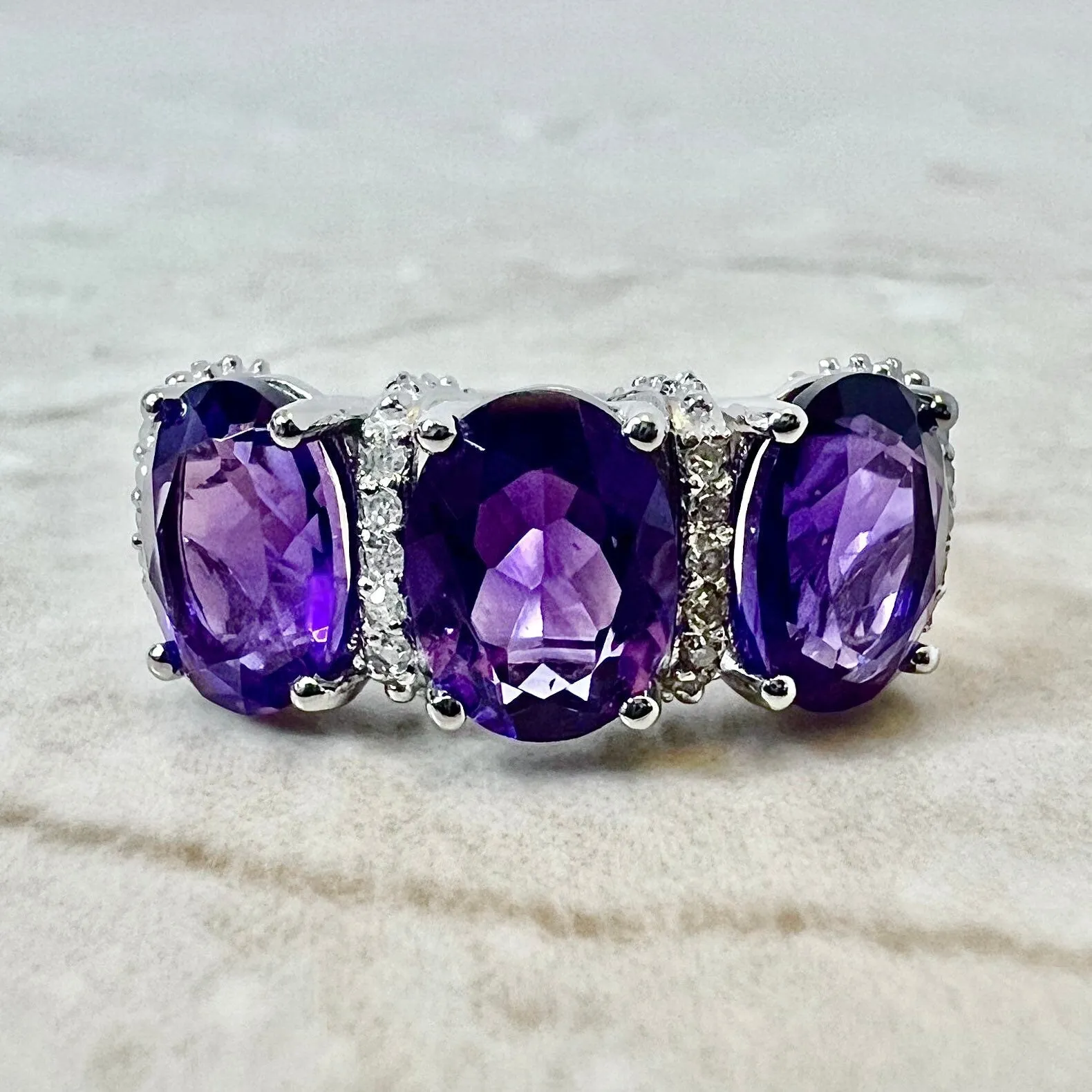 14 Karat White Gold Oval Amethyst & Diamond Three-Stone Ring