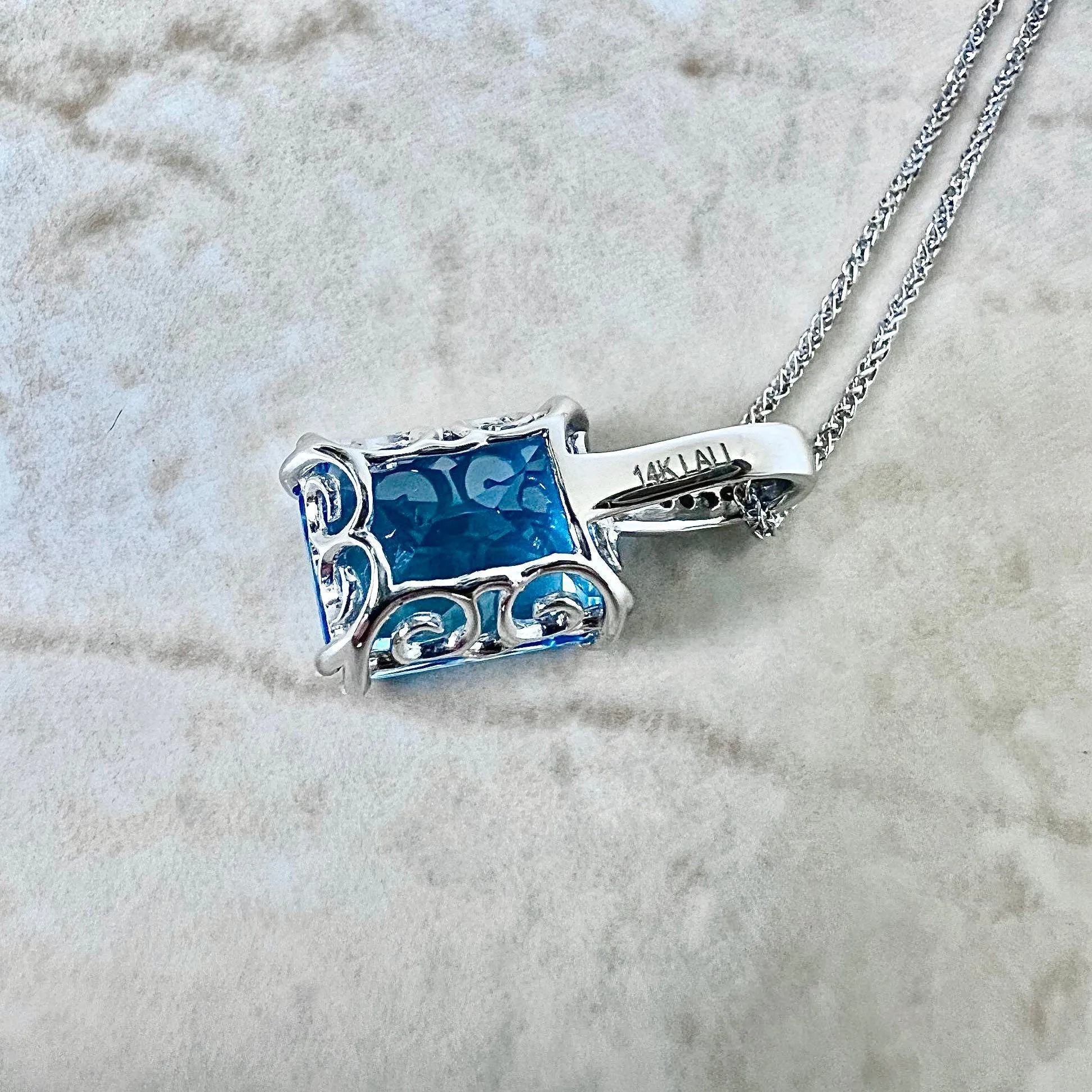 14 Karat White Gold Radiant Cut Swiss Blue Topaz & Diamond Ring And Pendant Necklace Set