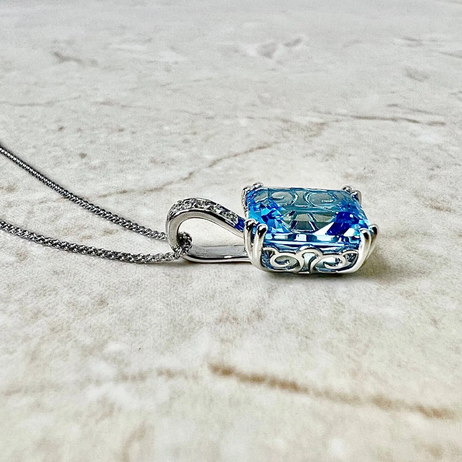14 Karat White Gold Radiant Cut Swiss Blue Topaz & Diamond Ring And Pendant Necklace Set