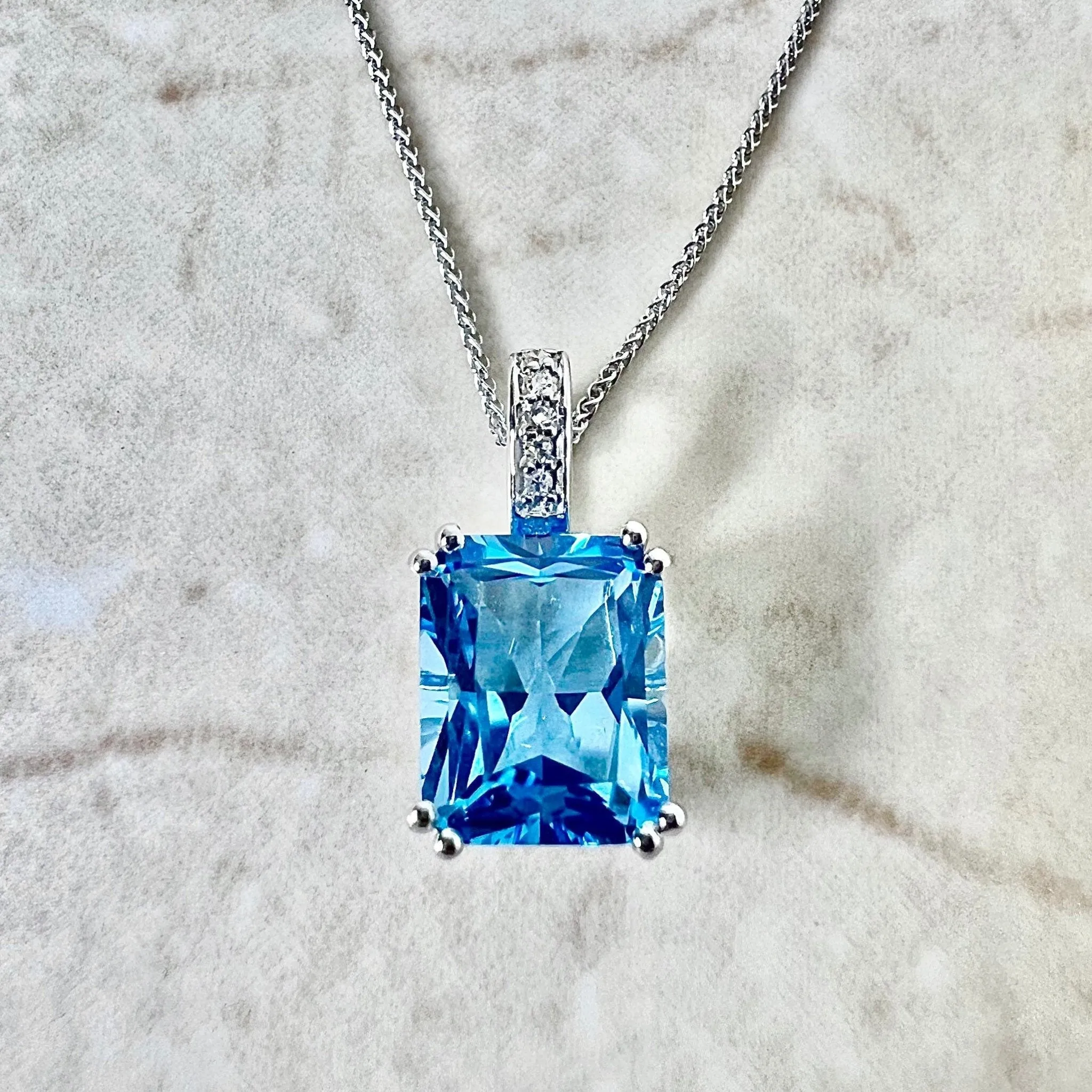 14 Karat White Gold Radiant Cut Swiss Blue Topaz & Diamond Ring And Pendant Necklace Set