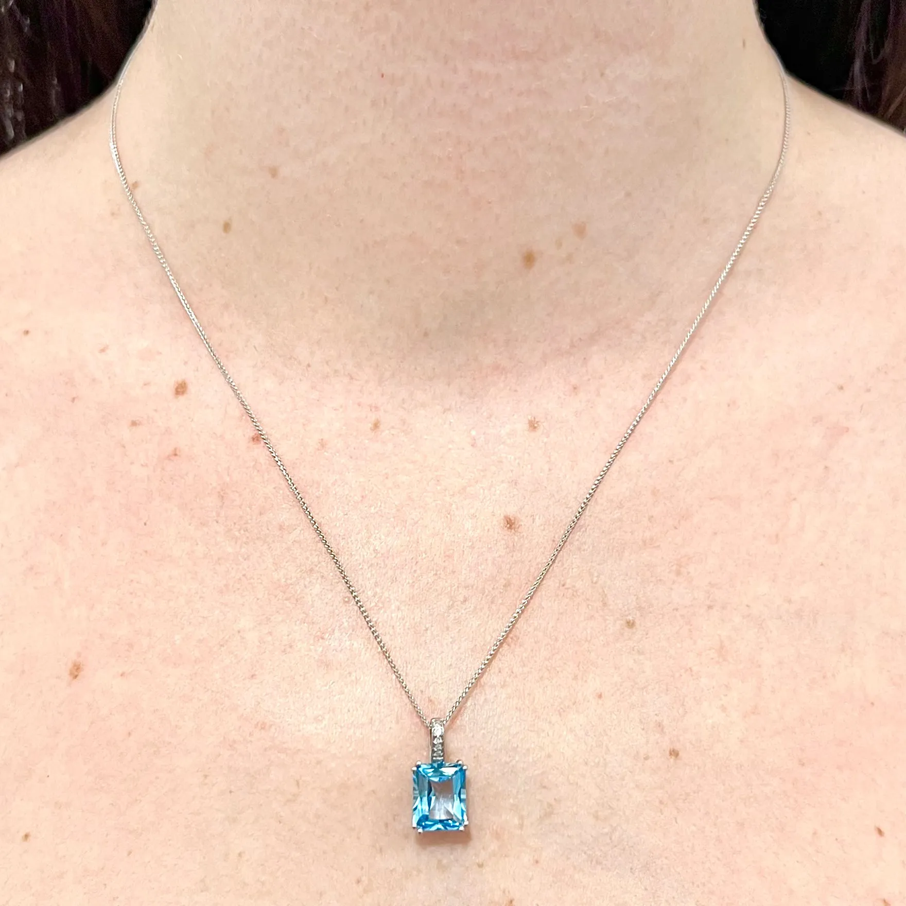 14 Karat White Gold Radiant Cut Swiss Blue Topaz & Diamond Ring And Pendant Necklace Set