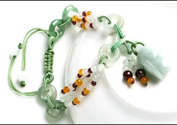 Genuine A  Jade Roses w/garnet Braided Retractable bracelet
