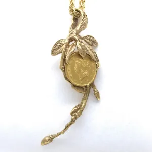 Leaf cluster with twigs and buds set with an 1851 U.S. gold dollar