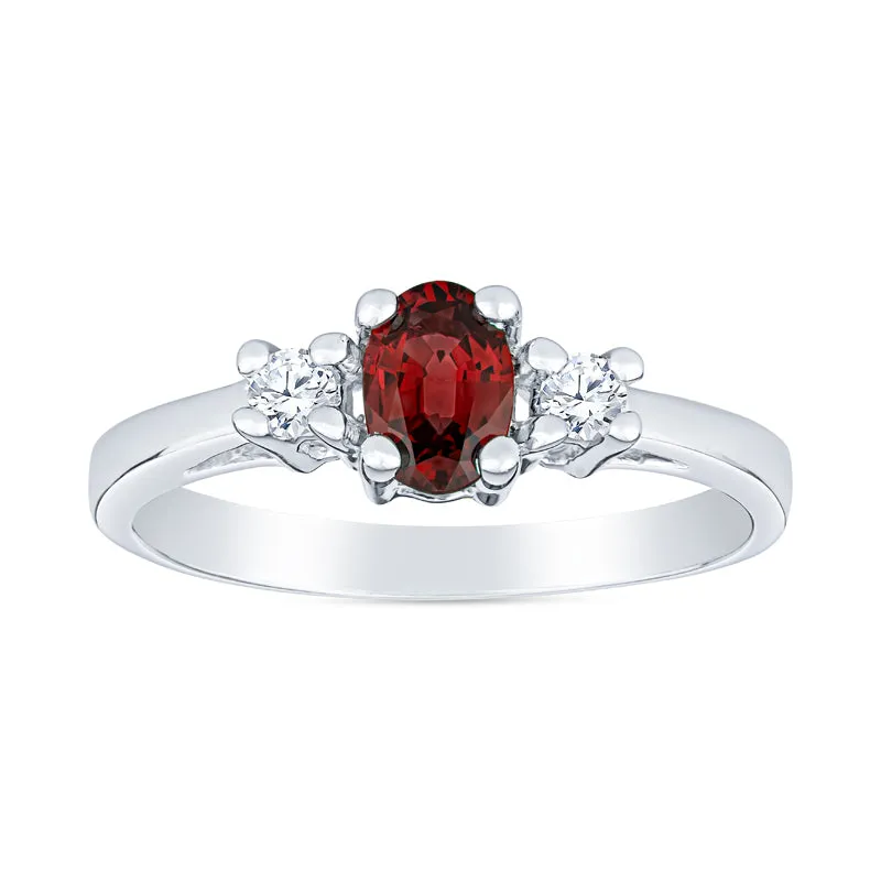 Oval Emerald and Diamond Ring