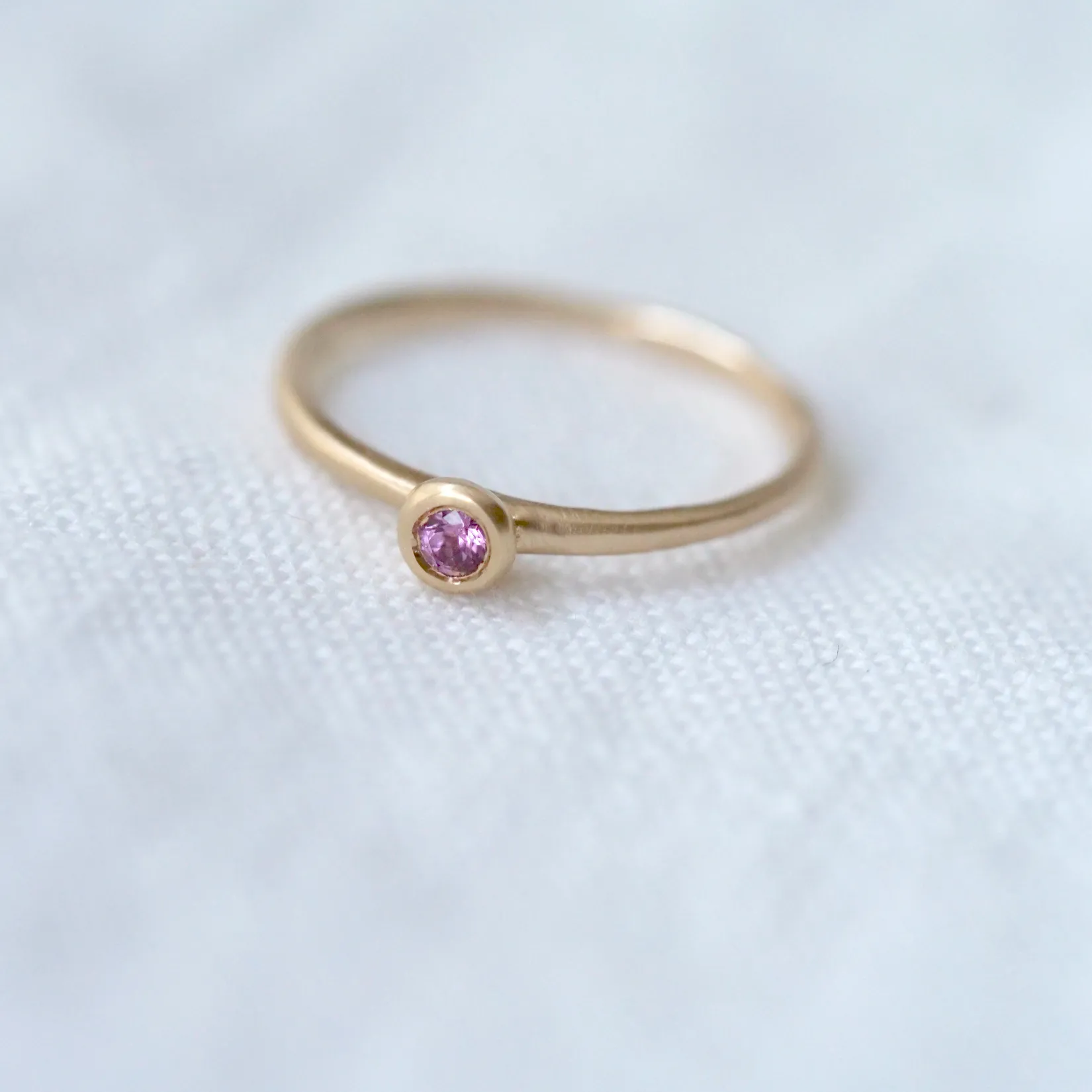 Sacred Bezel Pink Garnet