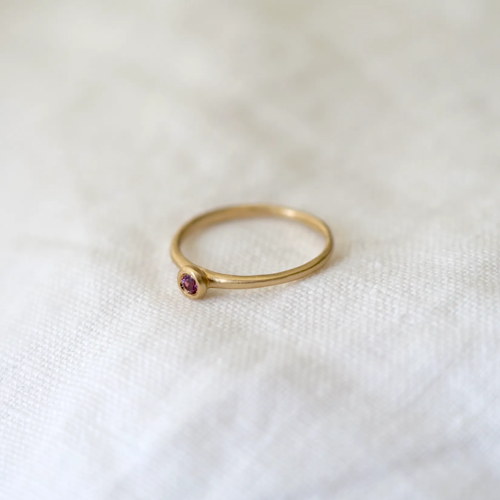 Sacred Bezel Pink Garnet